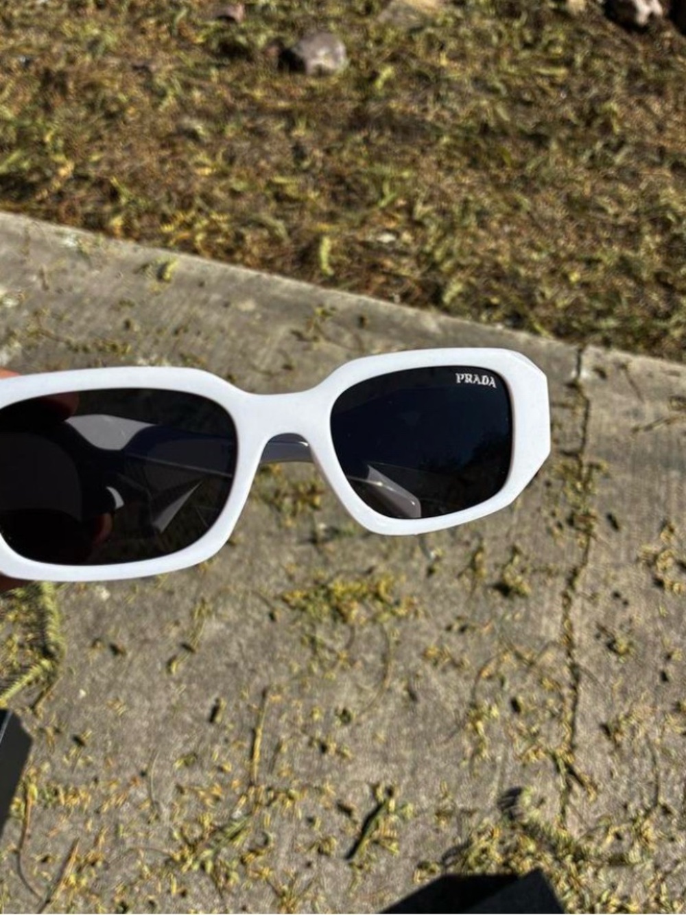 Prada White Frame Sunglasses with Black Lenses